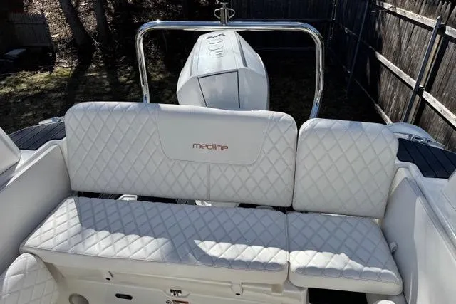 Slide: The Image of 2024 Zodiac Medline 7.5 GT boat with white quilted seating and sleek design. - 17