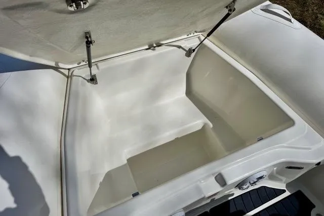 Slide: The Image of Open storage compartment of 2024 Zodiac Medline 7.5 GT boat. - 23