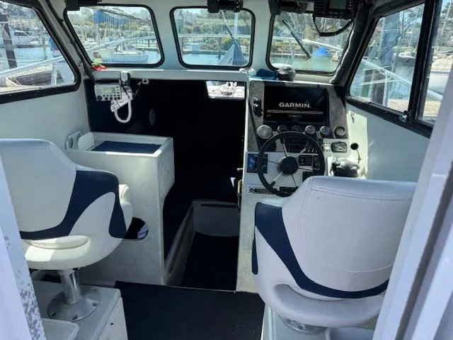 Slide: The Image of Interior of a 2007 Radon Signature 26 boat with Garmin navigation system. - 6