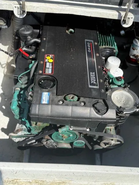 Slide: The Image of Engine compartment of a 2007 Radon Signature 26 boat, featuring a Volvo Penta engine. - 9