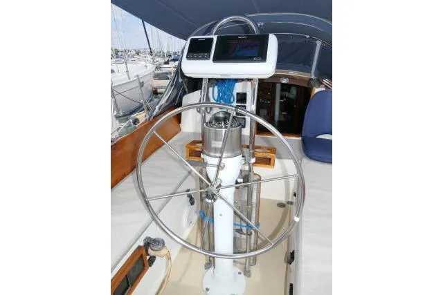 Slide: The Image of Cockpit of 1982 Cape Dory 36 sailboat with steering wheel and navigation equipment. - 29