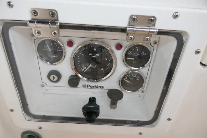 Slide: The Image of Instrument panel of a 1982 Cape Dory 36 sailboat with Perkins gauges. - 30