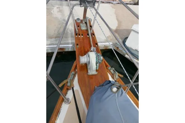 Slide: The Image of Bow of 1982 Cape Dory 36 sailboat with anchor windlass and teak deck. - 35