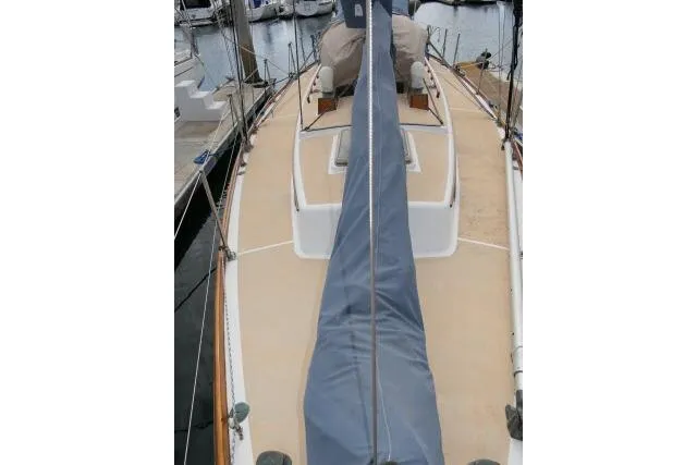 Slide: The Image of 1982 Cape Dory 36 sailboat deck view at marina. - 37