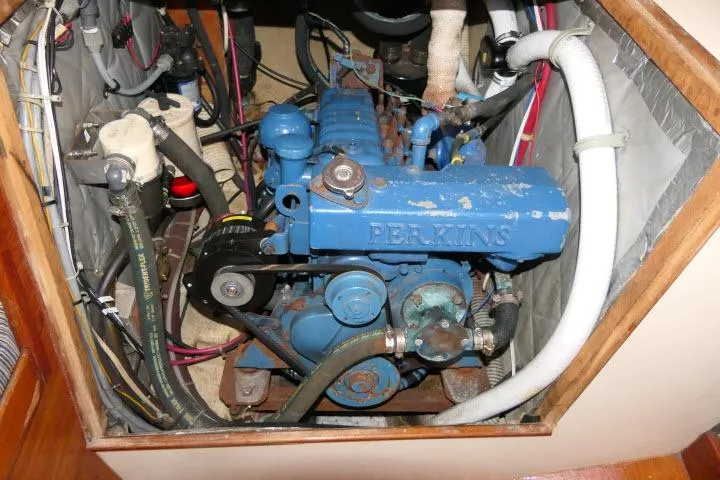 Slide: The Image of Engine compartment of a 1982 Cape Dory 36 sailboat with a Perkins engine. - 49