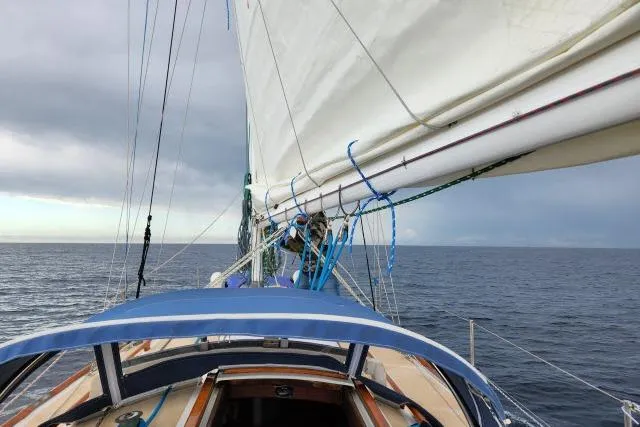 Slide: The Image of Sailing on a 1982 Cape Dory 36 yacht under cloudy skies. - 59