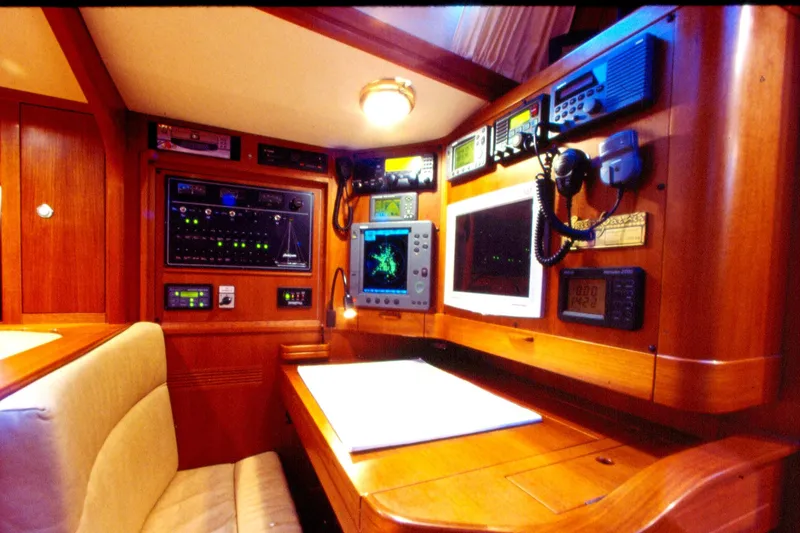 Slide: The Image of Navigation station inside a 2001 Baltic 52 yacht, featuring advanced marine electronics. - 11