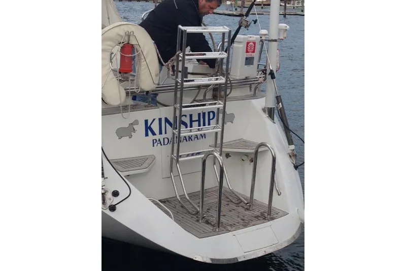 Slide: The Image of Sailing yacht Baltic 52, 2001 model, docked with a person on deck. - 7