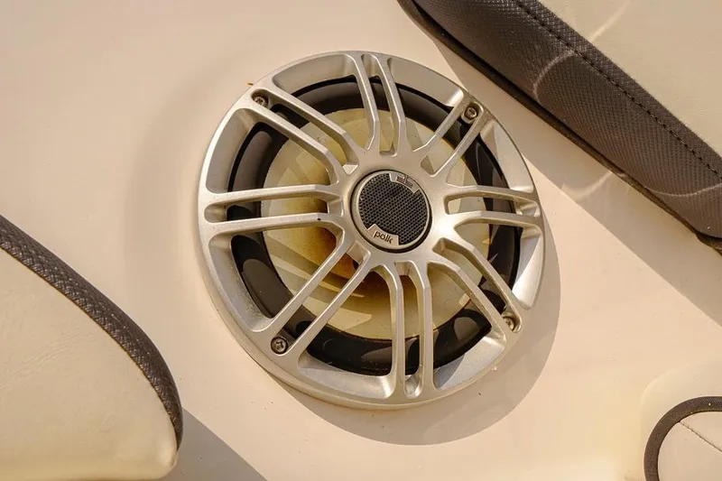 Slide: The Image of Close-up of a Polk speaker on a 2015 Yamaha Boats SX192. - 13