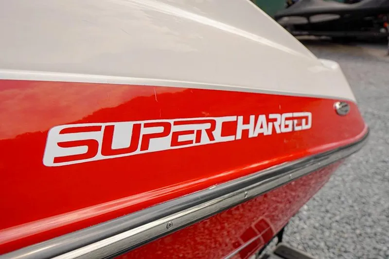Slide: The Image of 2015 Yamaha Boats SX192 with "Supercharged" decal on red and white hull. - 5