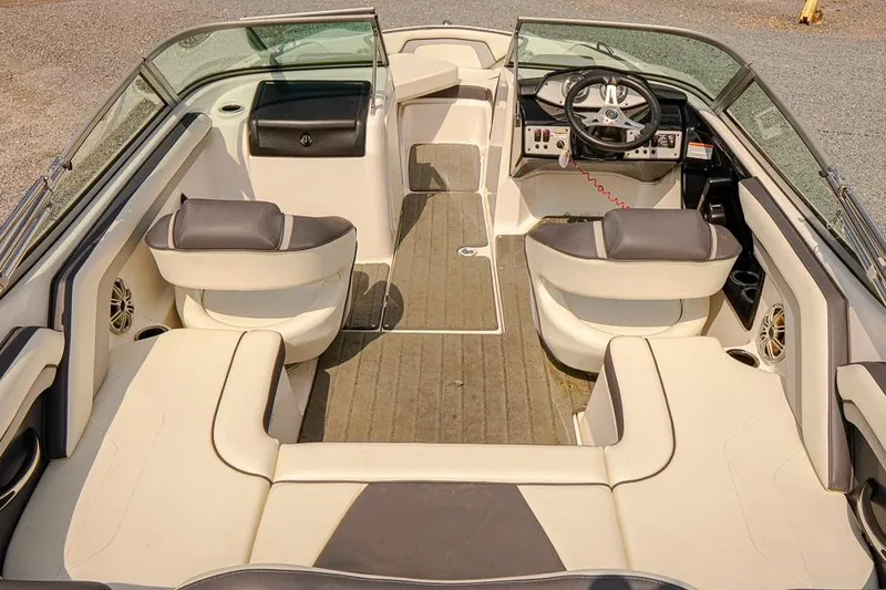 Slide: The Image of 2015 Yamaha Boats SX192 interior with seating and steering wheel. - 6
