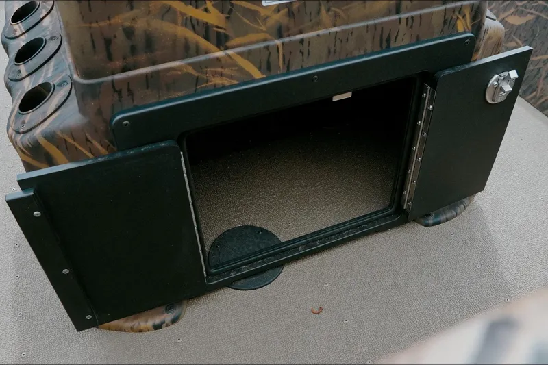 Slide: The Image of Open storage compartment on 2026 G3 Gator Tough 18 CC boat. - 10