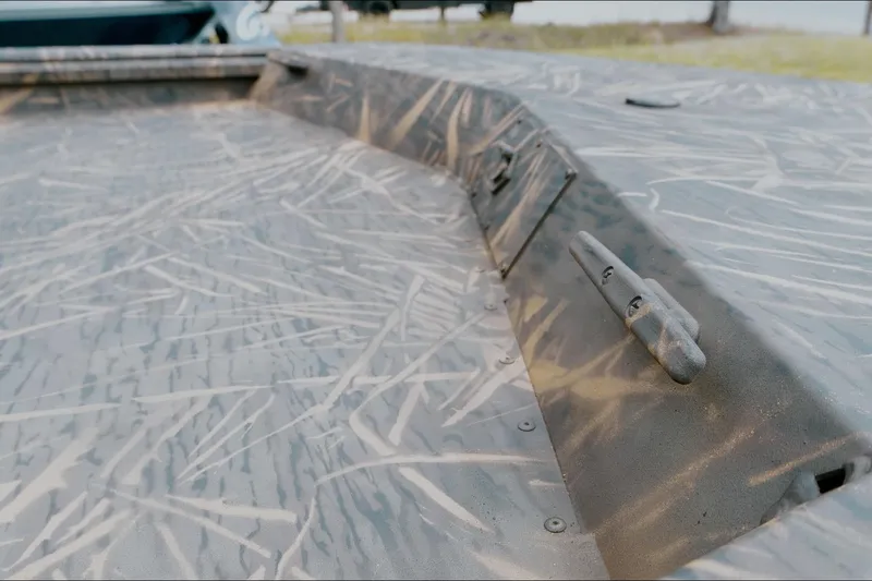 Slide: The Image of 2026 G3 Gator Tough 18 CC boat with camouflage pattern detail. - 11