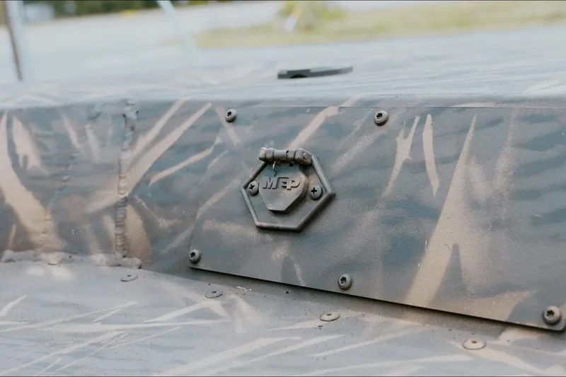 Slide: The Image of Camouflage detail on 2026 G3 Gator Tough 18 CC boat exterior. - 12