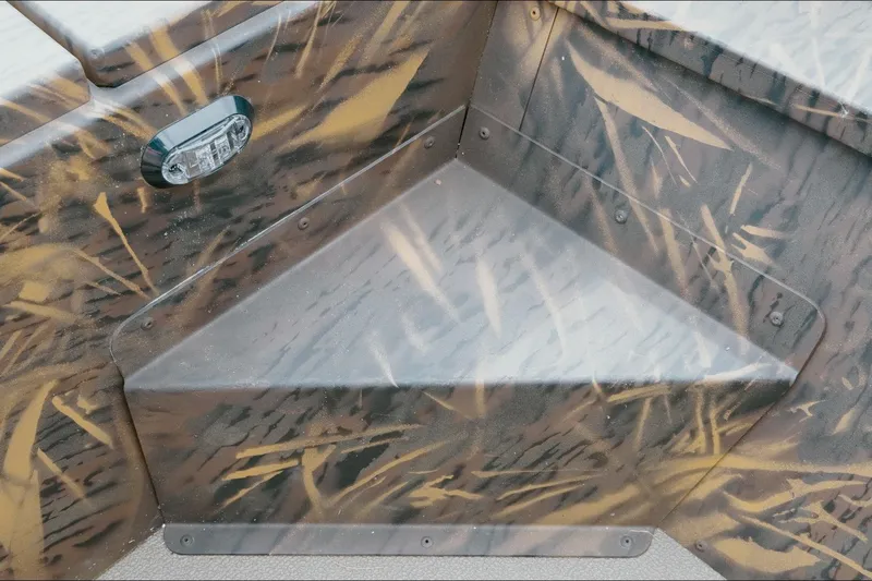 Slide: The Image of Interior detail of 2026 G3 Gator Tough 18 CC boat with camouflage pattern. - 14