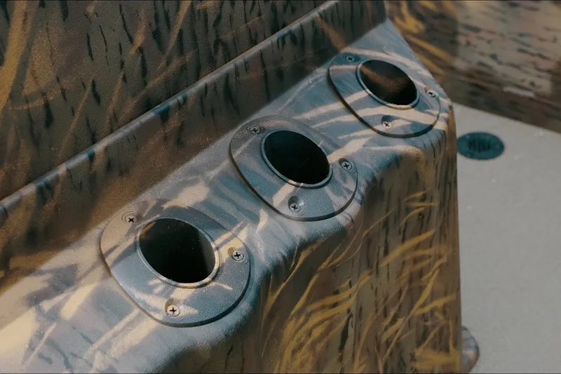 Slide: The Image of Rod holders on 2026 G3 Gator Tough 18 CC boat with camouflage design. - 4