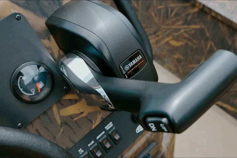 Slide: The Image of Close-up of Yamaha throttle control on 2026 G3 Gator Tough 18 CC boat. - 6