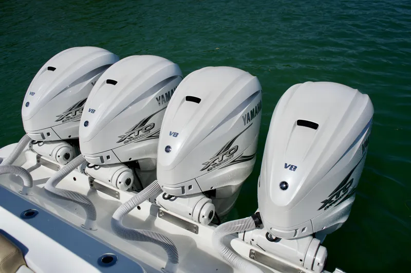 Slide: The Image of Four Yamaha XTO V8 outboard engines on a 2019 HCB 53 Suenos boat. - 13