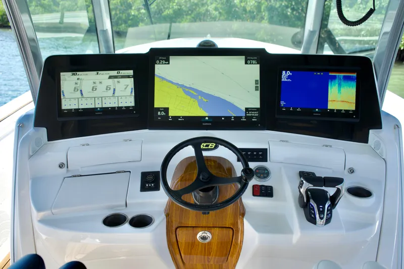 Slide: The Image of 2019 HCB 53 Suenos helm with advanced navigation displays and controls. - 21