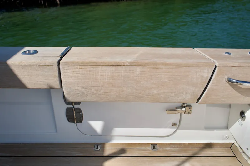 Slide: The Image of 2019 HCB 53 Suenos boat deck with wooden finish and metal fittings. - 30