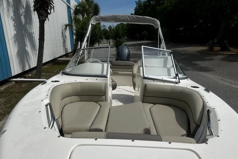 Slide: The Image of 2022 Key West 203 DFS boat with spacious seating and open windshield. - 3