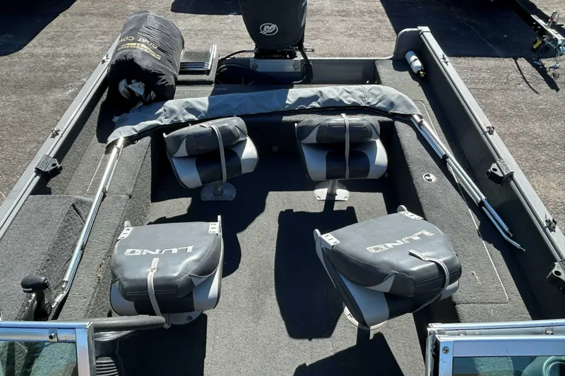Slide: The Image of 2013 Lund 1775 Impact XS boat interior with seating and equipment. - 8