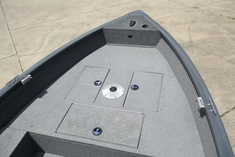 Slide: The Image of 2014 Bass Cat Puma FTD boat deck with storage compartments. - 5