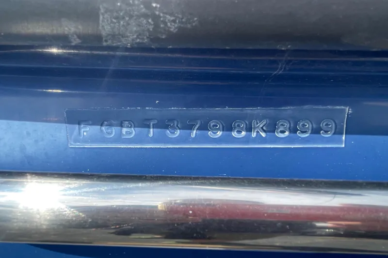 Slide: The Image of Hull identification number on a 1999 Chaparral 1830 SS boat. - 17