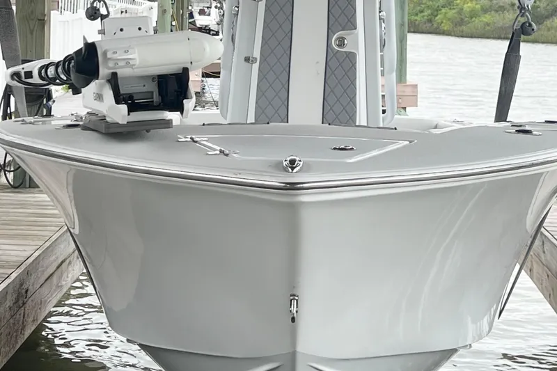 Slide: The Image of 2021 Latitude Tournament Boats 25 docked, featuring sleek design and advanced equipment. - 3