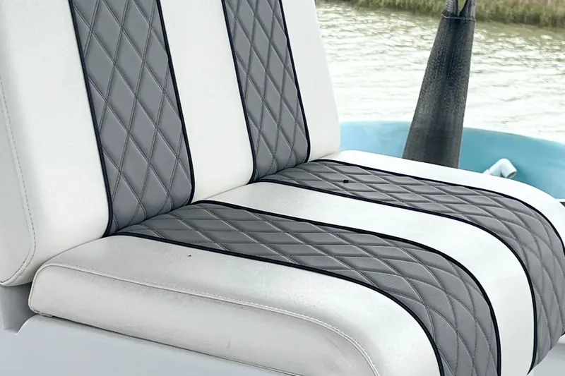 Slide: The Image of Luxury seating on 2021 Latitude Tournament Boats 25, featuring diamond-stitched upholstery. - 6
