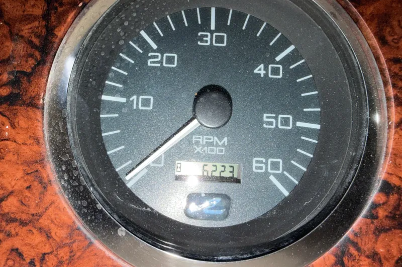 Slide: The Image of Close-up of a 2002 Sea Ray 360 Sundancer RPM gauge displaying 6223 hours. - 15