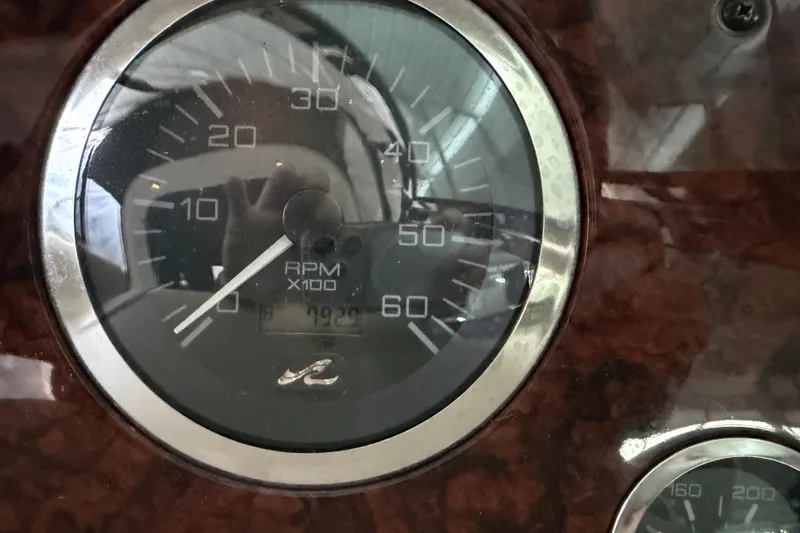 Slide: The Image of Close-up of 2002 Sea Ray 360 Sundancer RPM gauge showing 792 hours. - 16