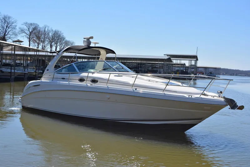 Slide: The Image of 2002 Sea Ray 360 Sundancer on calm water. - 3