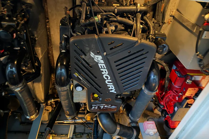 Slide: The Image of Engine compartment of a 2002 Sea Ray 360 Sundancer with Mercury 8.1S Horizon engine. - 35