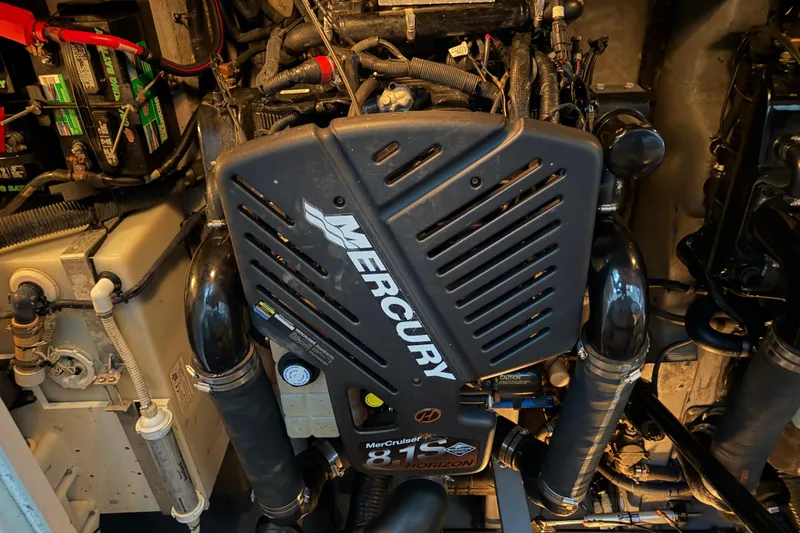 Slide: The Image of Engine compartment of a 2002 Sea Ray 360 Sundancer with Mercury 8.1S Horizon engine. - 36