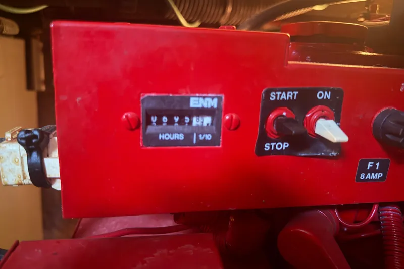 Slide: The Image of Control panel of a 2002 Sea Ray 360 Sundancer boat engine. - 37