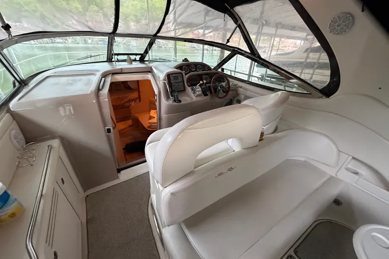 Slide: The Image of Interior view of 2002 Sea Ray 360 Sundancer yacht cockpit and cabin entrance. - 8