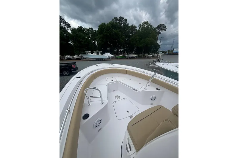 Slide: The Image of 2025 Sportsman Heritage 231 Center Console boat with spacious seating and sleek design. - 10