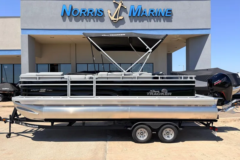 The Image of 2026 Sun Tracker SportFish 22 DLX pontoon boat at Norris Marine dealership. - 1