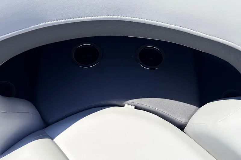 Slide: The Image of Interior seating of 2026 Sun Tracker SportFish 22 DLX with cup holders. - 22