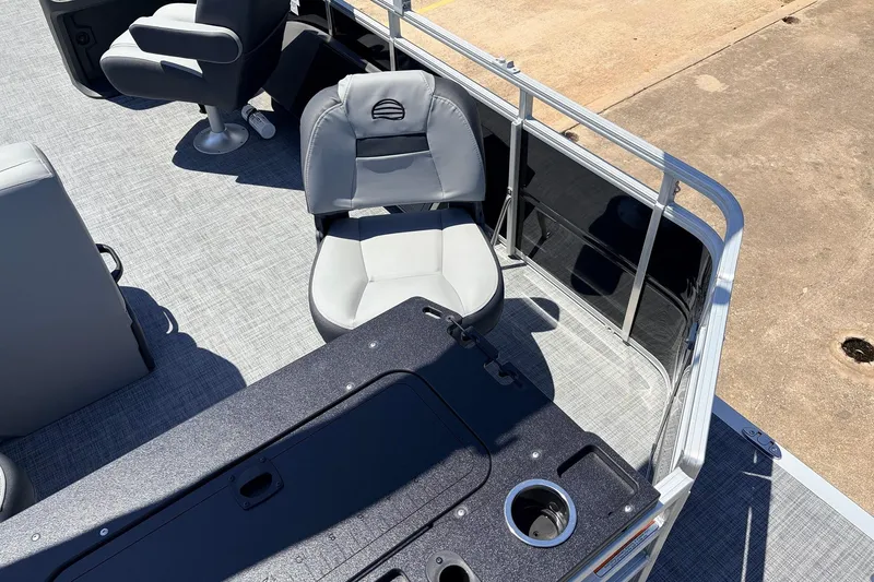 Slide: The Image of Sun Tracker SportFish 22 DLX 2026 boat interior with seating and cup holder. - 40