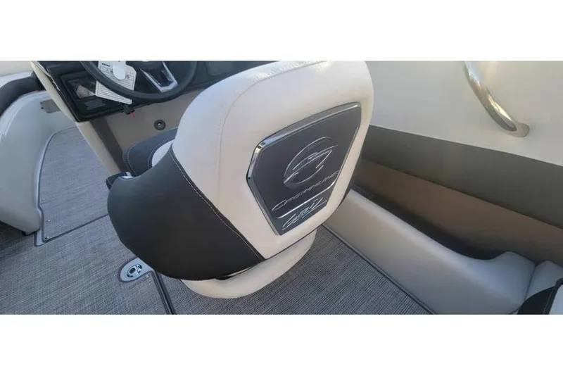 Slide: The Image of 2024 Crownline 210 SS boat interior with branded seat and sleek design. - 17