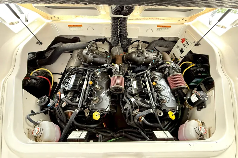 Slide: The Image of 2019 Chaparral Vortex 223 VRX engine compartment with dual Rotax engines. - 34