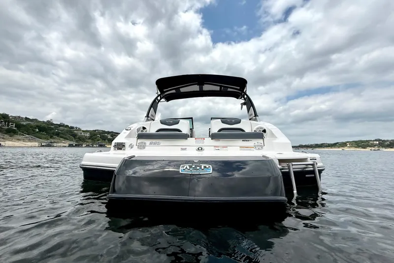 Slide: The Image of 2019 Chaparral Vortex 223 VRX boat on water under cloudy sky. - 5