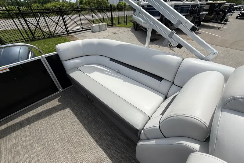 Slide: The Image of 2022 Godfrey Sweetwater 2286 SB pontoon boat with plush white seating and spacious deck. - 10