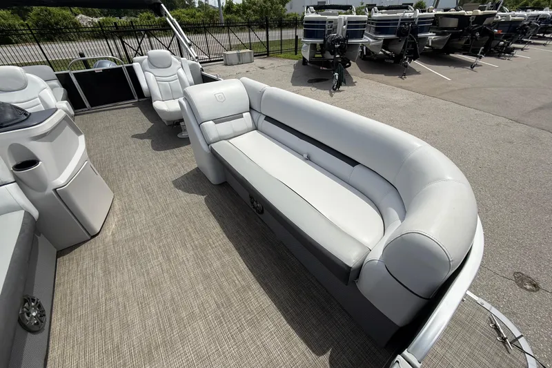 Slide: The Image of 2022 Godfrey Sweetwater 2286 SB pontoon boat interior with plush seating and modern design. - 6