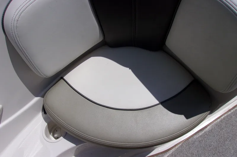 Slide: The Image of 2007 Sea Ray 185 Sport boat seat with gray and black upholstery. - 15