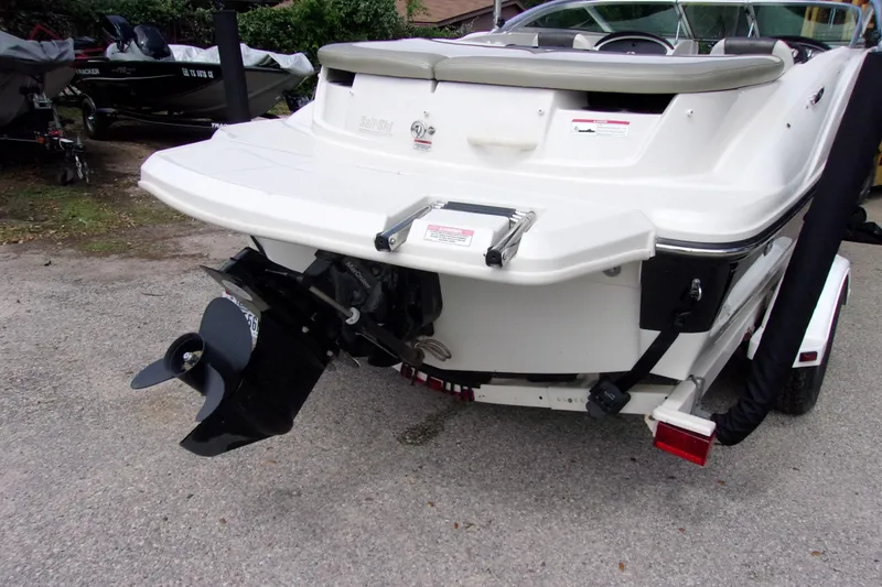 Slide: The Image of 2007 Sea Ray 185 Sport boat rear view with outboard motor on trailer. - 3