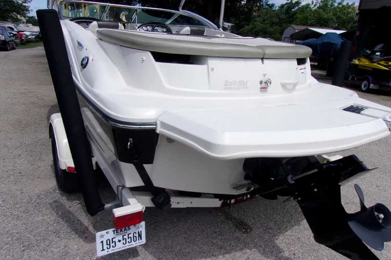 Slide: The Image of 2007 Sea Ray 185 Sport boat rear view with trailer in outdoor setting. - 4