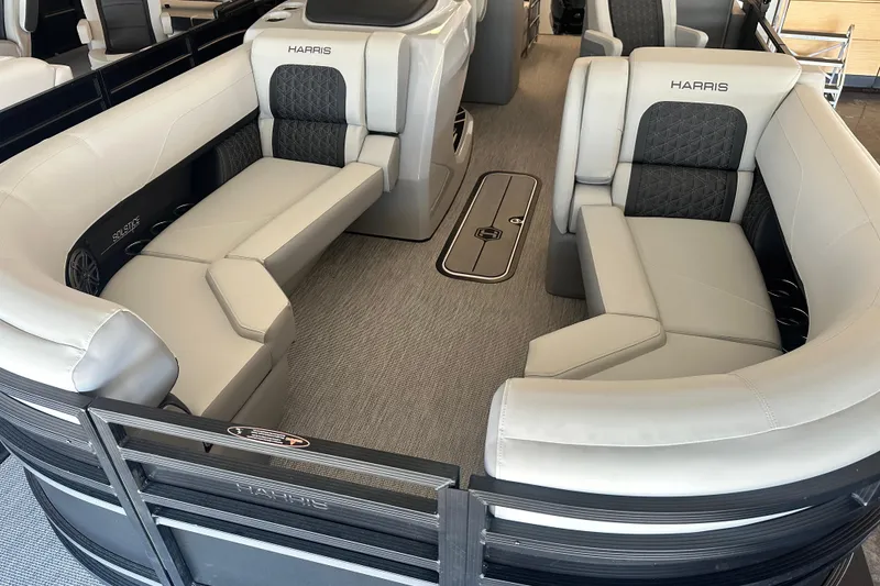 Slide: The Image of Luxurious interior of 2026 Harris Solstice 230 CWDH pontoon boat with plush seating. - 3